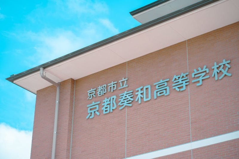 Shirahige Falls cascading into blue river in Biei
