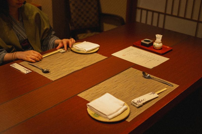 Traditional Japanese dining table with dishes and tea