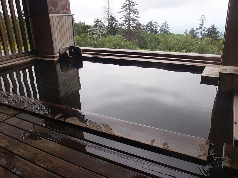 Outdoor bath at Kamihoroso onsen overlooking the Furano basin