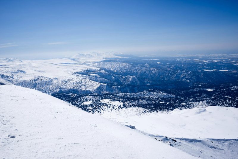 Winter mountain landscape with snow-covered slopes in Hokkaido