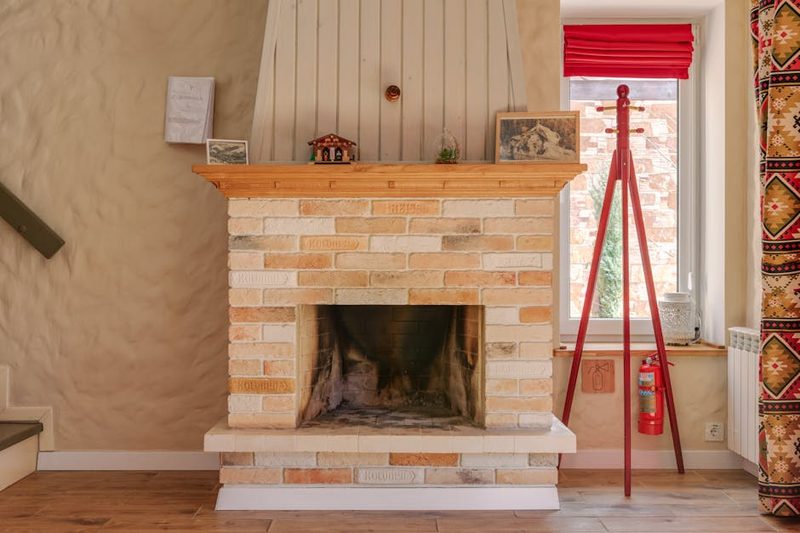 Warm and cozy apres-ski bar with fireplace atmosphere